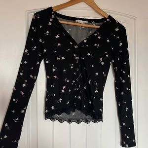 Size S but could easily fit as a M, black w/flowers, PINK ROSE brand.